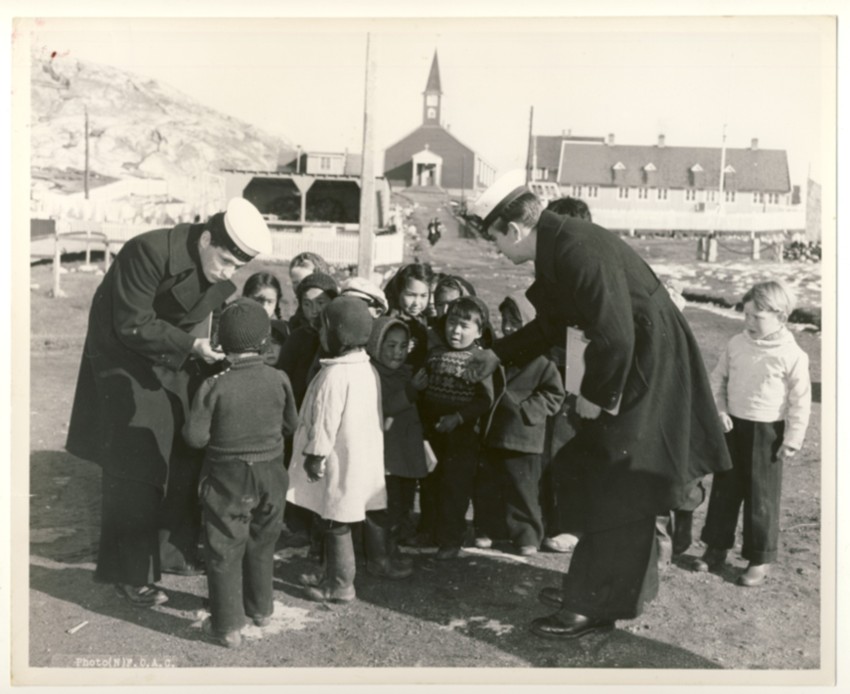 Image for RCN Photograph of Two Canadian Sailors from HMCS Swansea with Children at Nuuk, Greenland, c. 1950