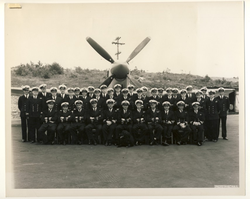 RCN Photograph of the Aircrew and Engineer Officers of the RCN's 18th Carrier Air Group in front of One of Their Firefly (Mk. IV) Aircraft, 6 July, 1949. Image for RCN Photograph of the Aircrew and Engineer Officers of the RCN's 18th Carrier Air Group in front of One of Their Firefly (Mk. IV) Aircraft, 6 July, 1949.